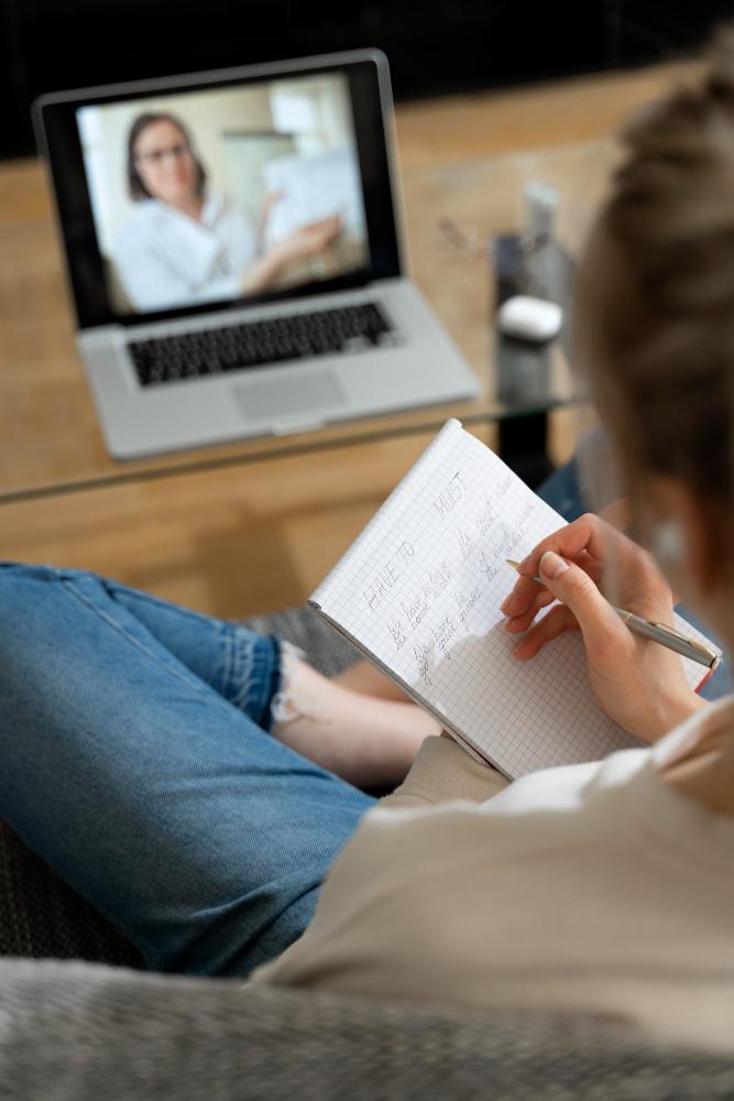Student learning online from home with teacher support